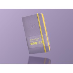 Cuaderno con gomilla antartik notes tapa dura a6 hojas cuadricula morado y amarillo 100 hojas 80 gr fsc